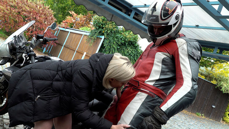 Blonde Exhibitionist Blows A Biker